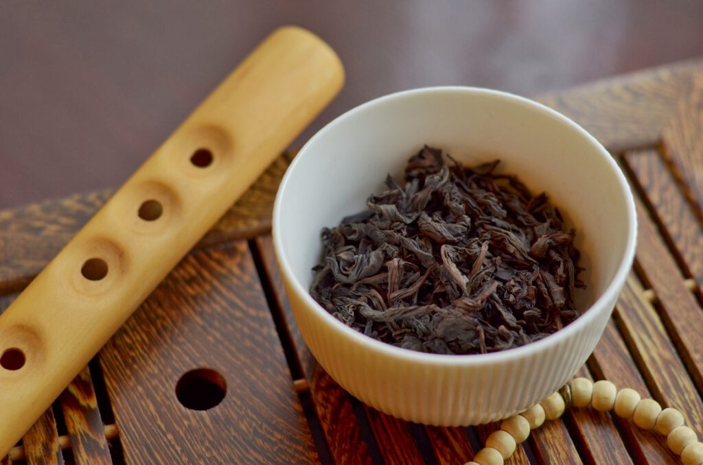 Photo: Dry tea leaves in a cup
