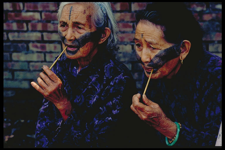 Photo: Two atayal elder women with traditional facial tattoos