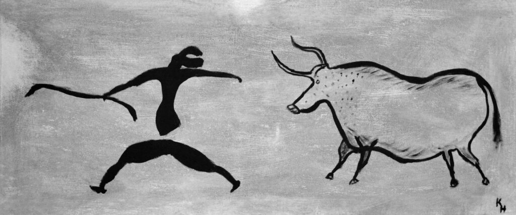 Photo: Cave art of man and ox