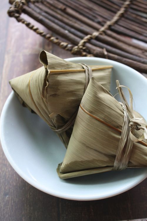 Photo: Rice dumplings wrapped in bamboo leaves